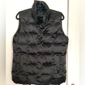 Womens puffer vest. New. Medium